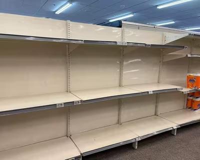 Empty toiled paper shelves at Waikanae New World