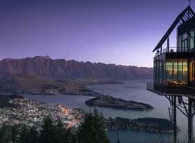 An Aerial Photography of a Glass Building with a Beautiful View